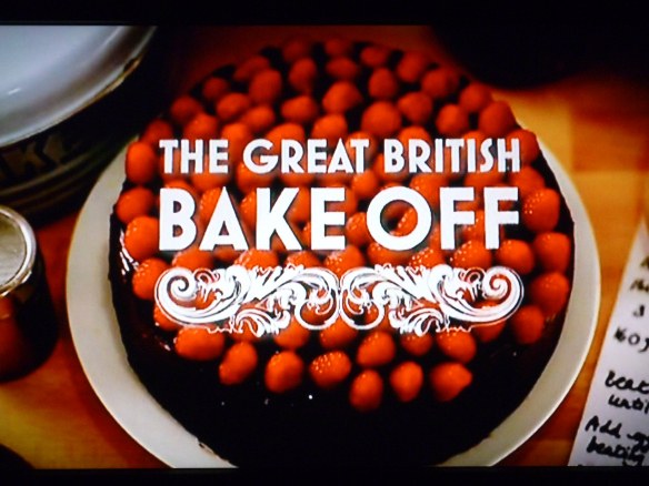 A cake topped with red berries, from a Great British Bake Off launch campaign